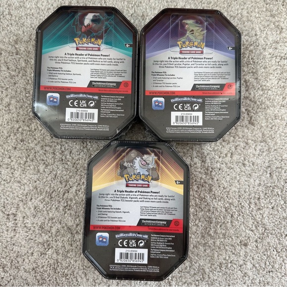 3x Pokémon TCG Triple Whammy Back Issue Collector Tins Sealed - Picture 2 of 8